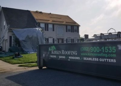 Dumpster for old roofing panels | Kirkin Exteriors